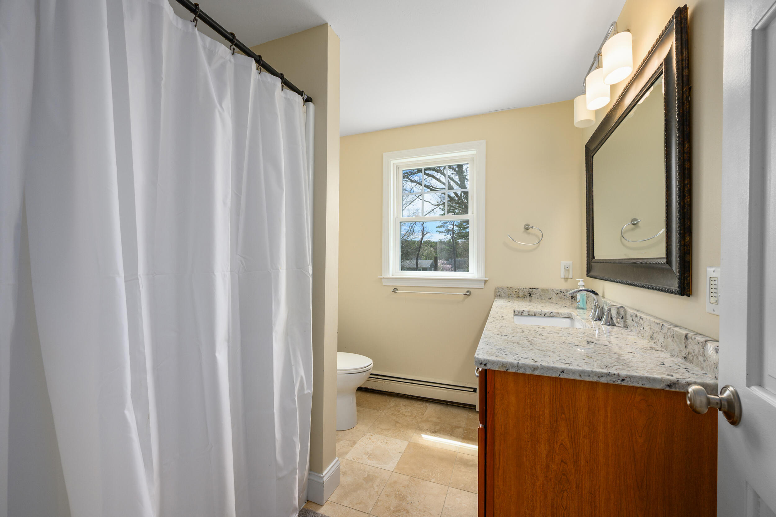 2 West Crossfield Road Forestdale, MA 02644 - Photo 30 of 41 a bathroom with a granite countertop sink and a mirror