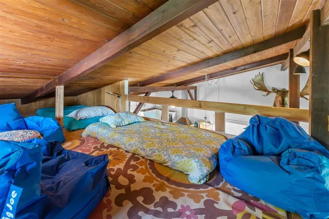 a blue bed sitting in a blue bed