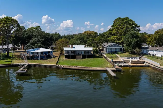 a swimming pool view with a sitting space
