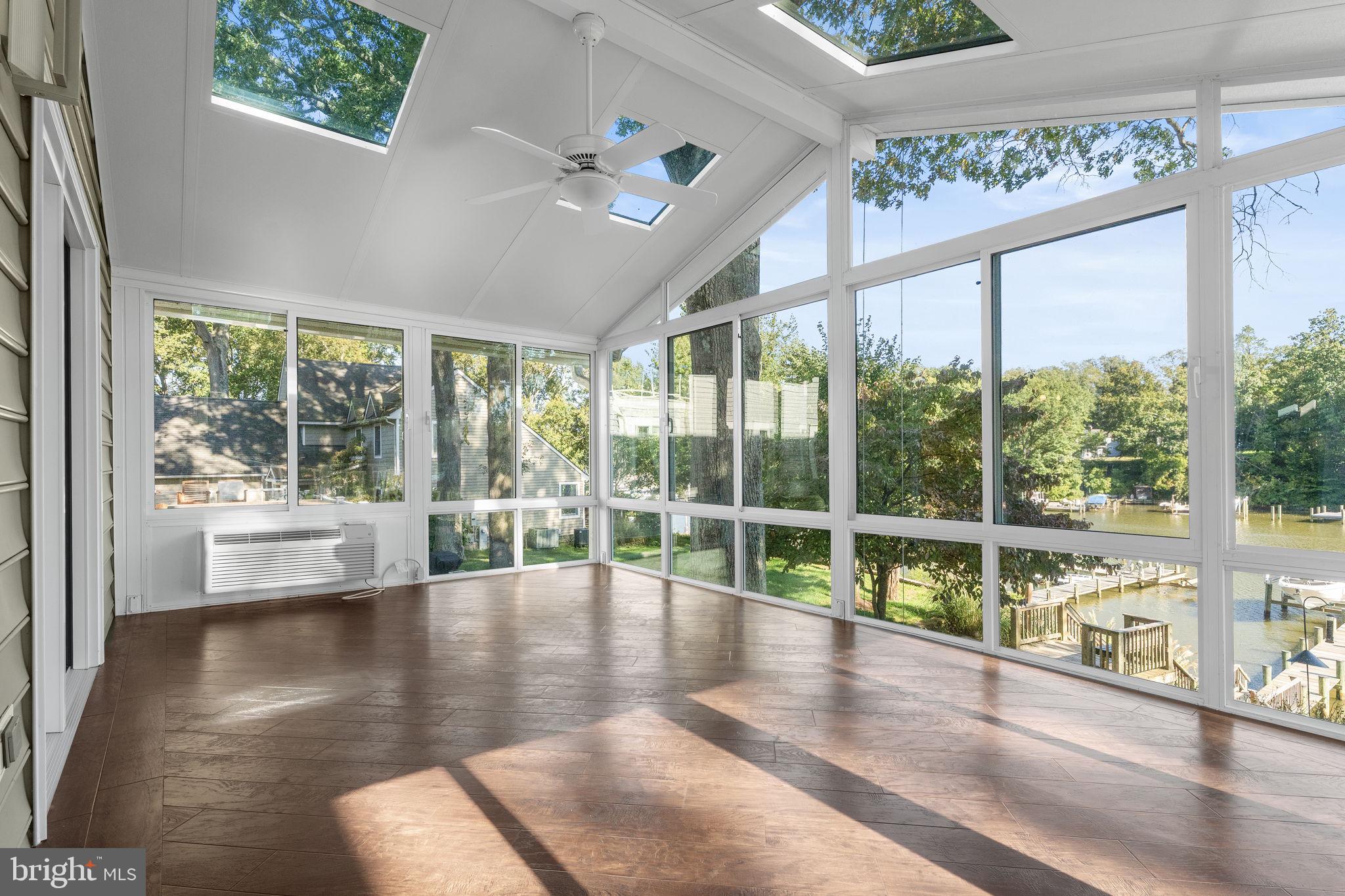 975 Phillips Drive Arnold, MD 21012 - Photo 21 of 93 a view of empty room with wooden floor and fan