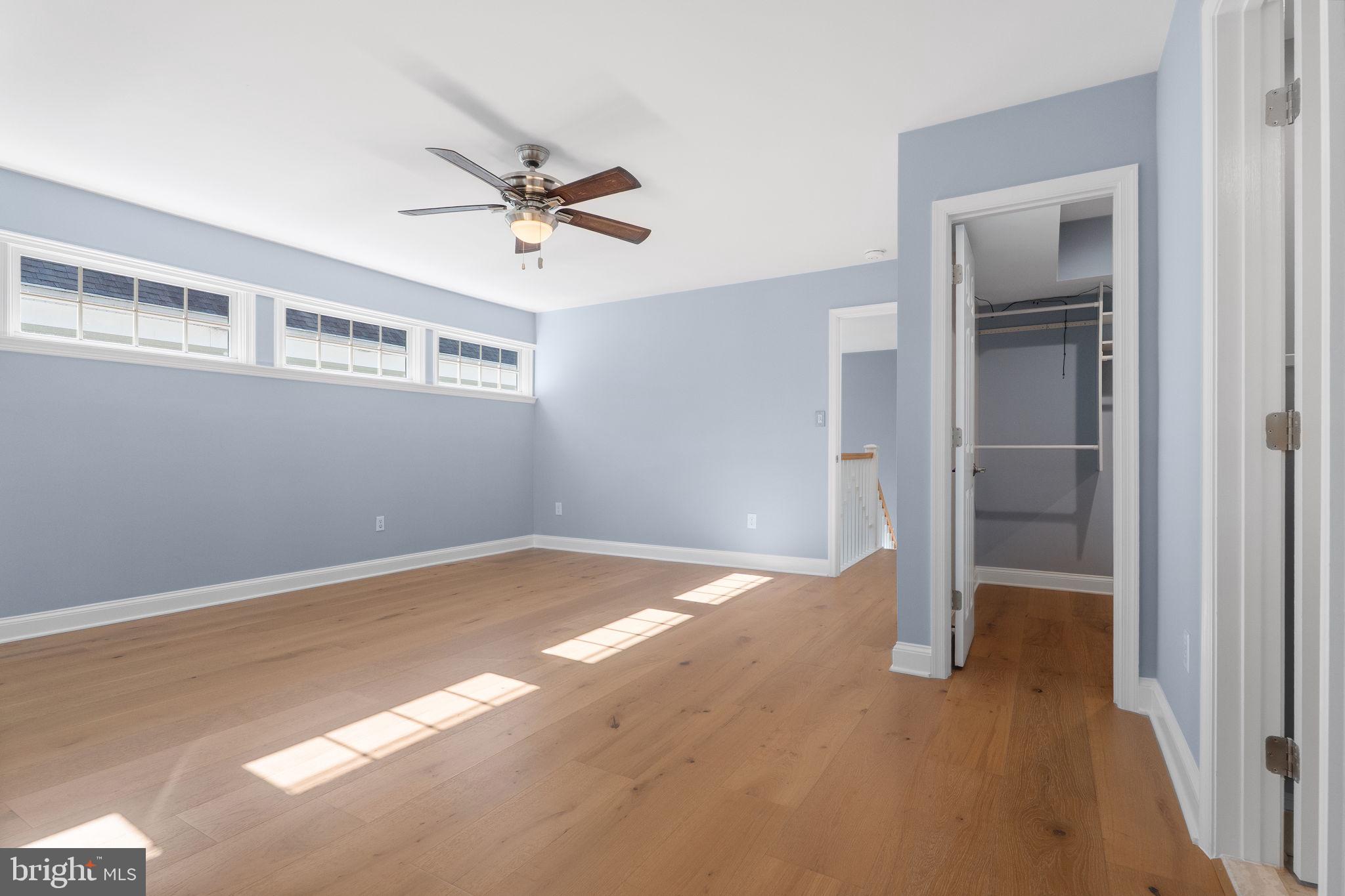 975 Phillips Drive Arnold, MD 21012 - Photo 39 of 93 a view of empty room with wooden floor and fan