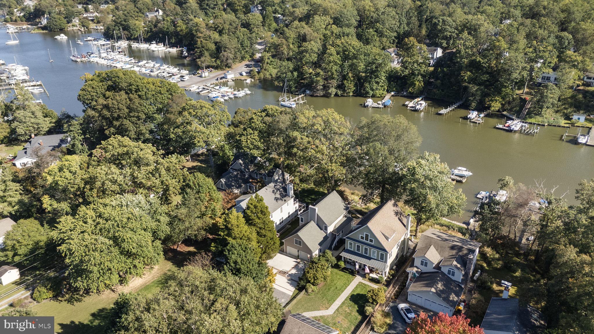 975 Phillips Drive Arnold, MD 21012 - Photo 79 of 93 an aerial view of residential house with outdoor space and lake view