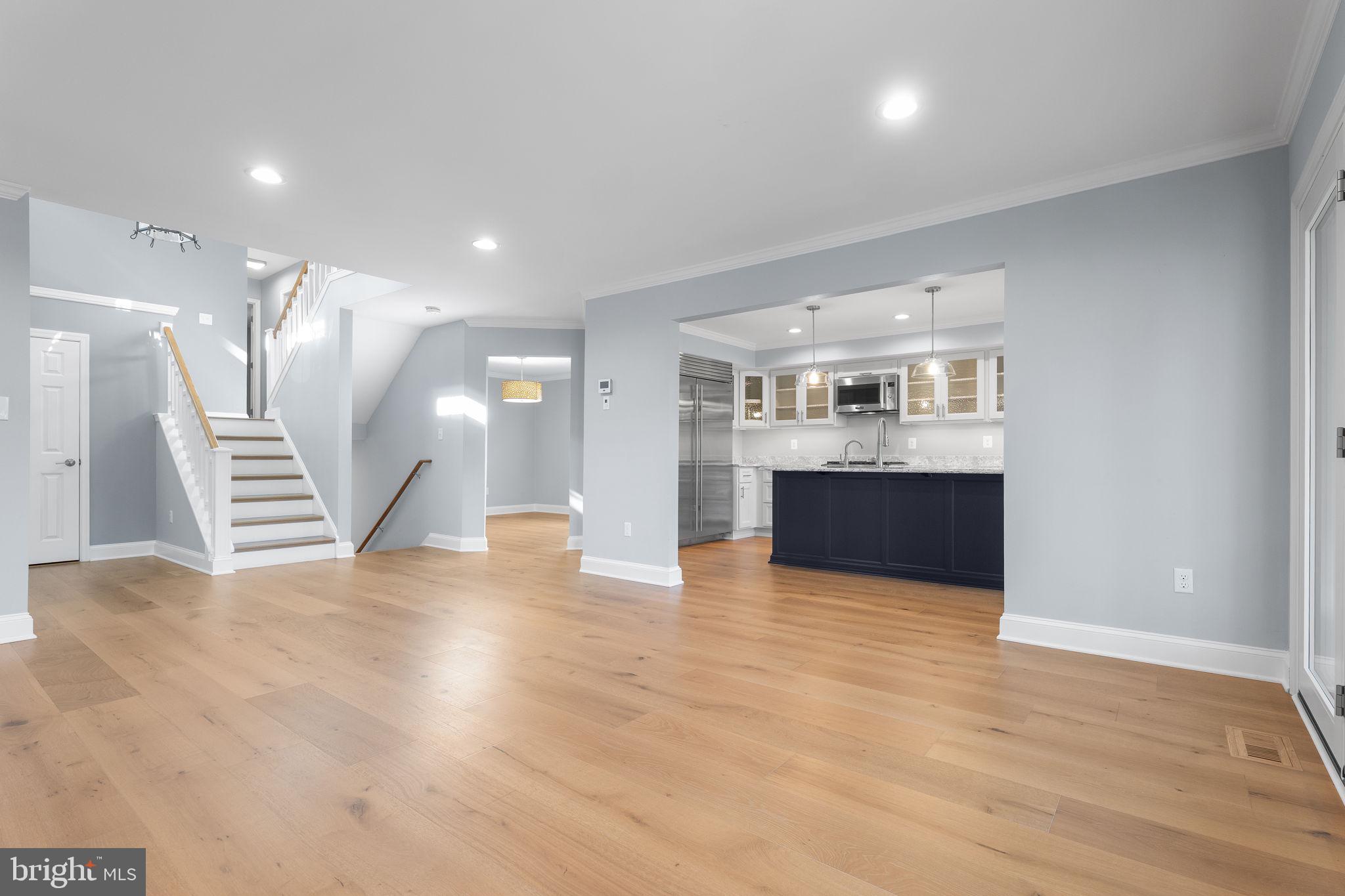 975 Phillips Drive Arnold, MD 21012 - Photo 10 of 93 a view of kitchen and hall with wooden floor