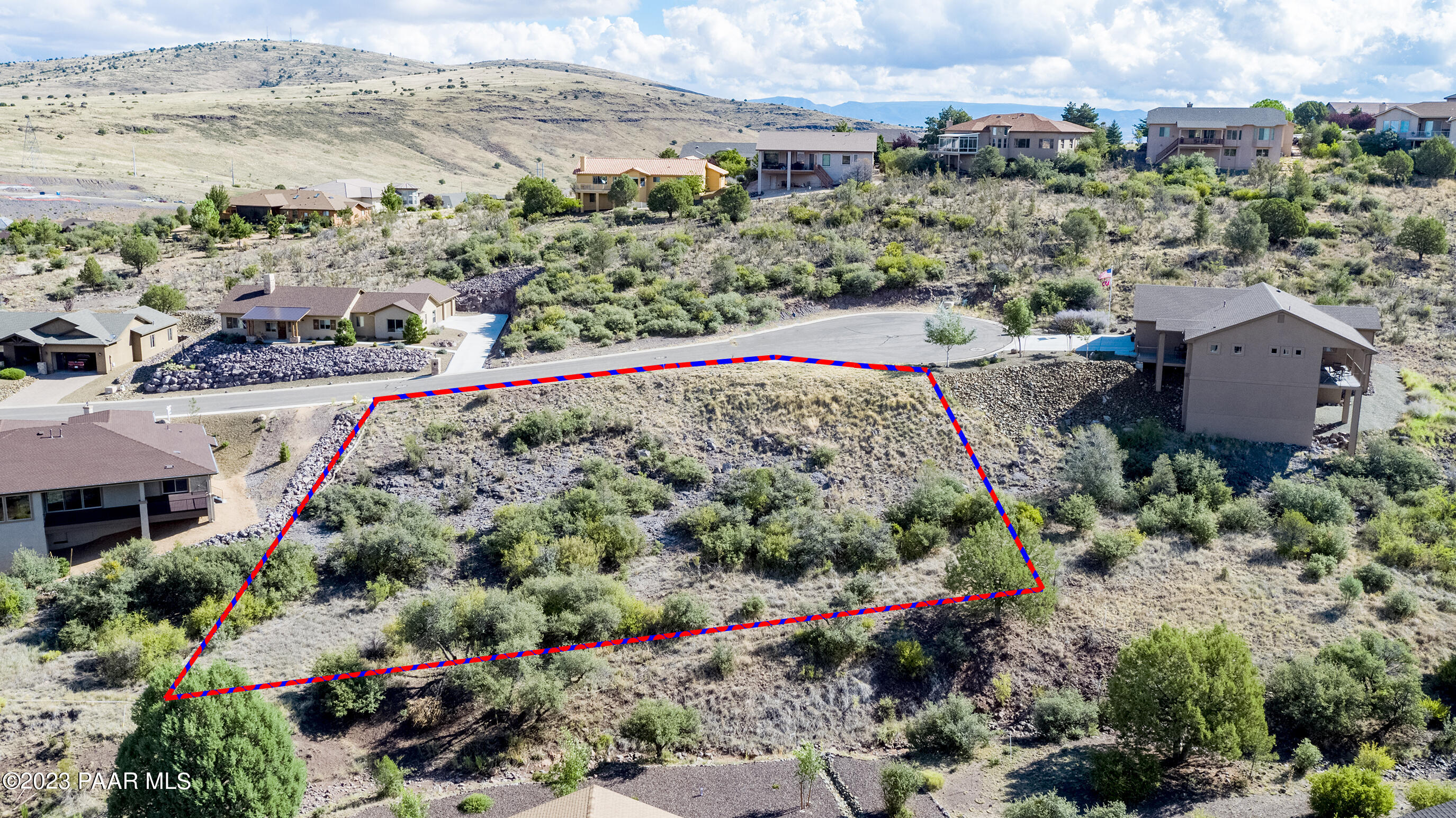Undisclosed Address Prescott, AZ 86301 - Photo 5 of 7 an aerial view of a house with a yard and lake view