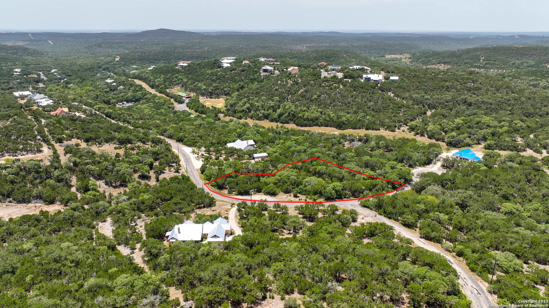 a view of city with ocean