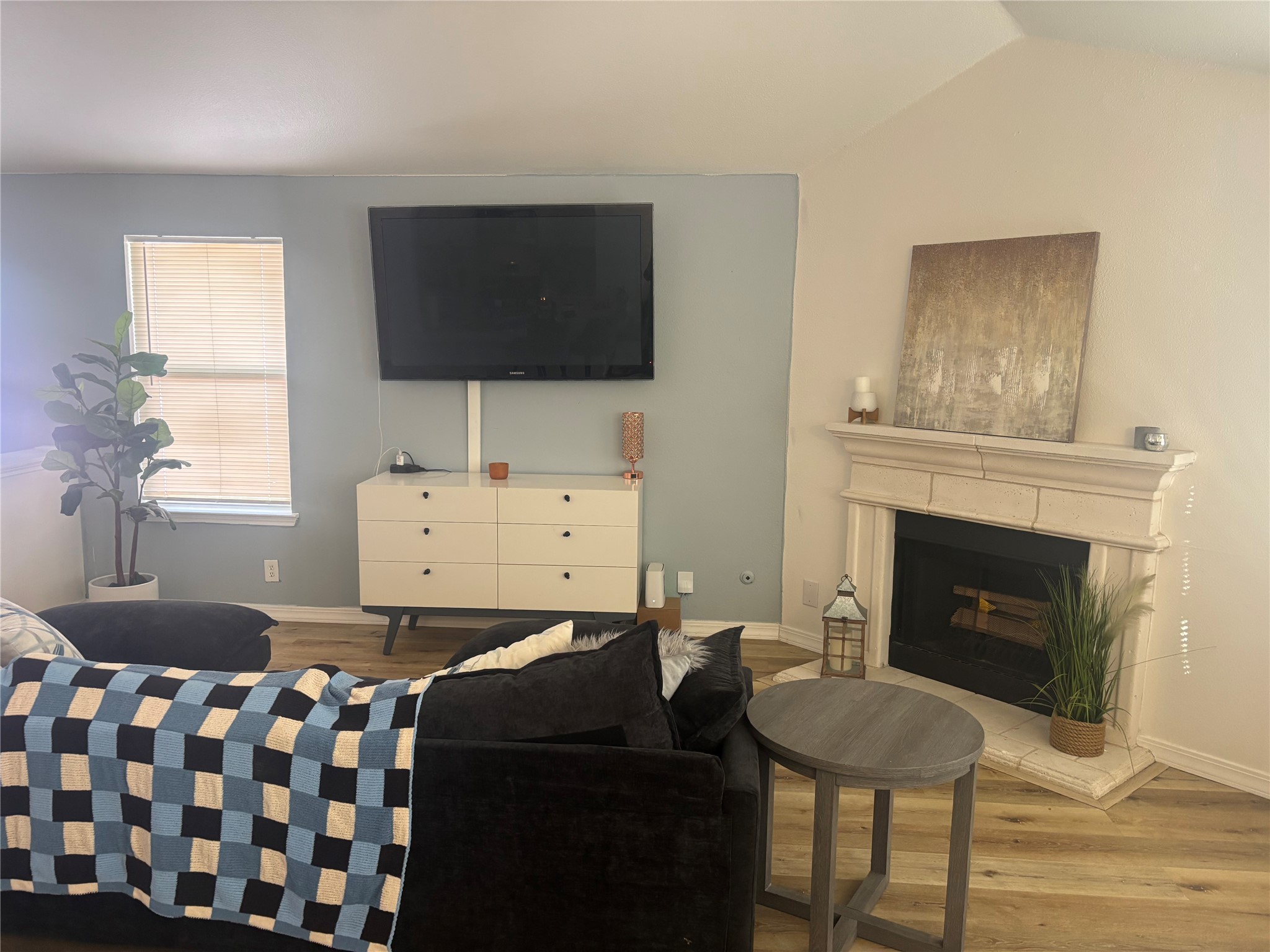 810 Honeysuckle Drive Leander, TX 78641 - Photo 4 of 9 a bedroom with a bed and a flat screen tv