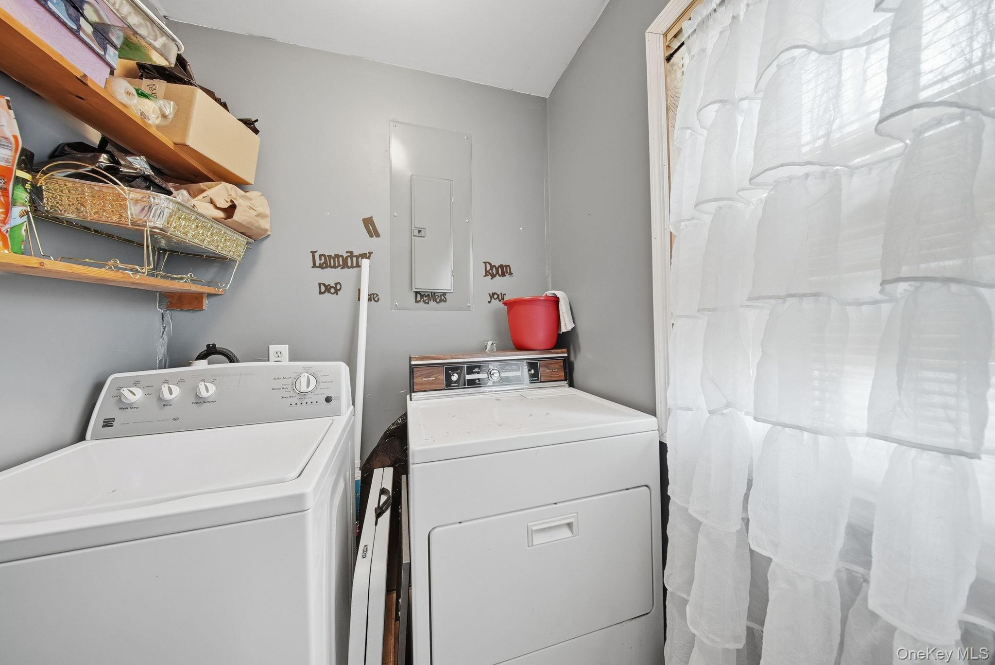 4 Ray Lane Loch Sheldrake, NY 12759 - Photo 18 of 29 a utility room with dryer and washer