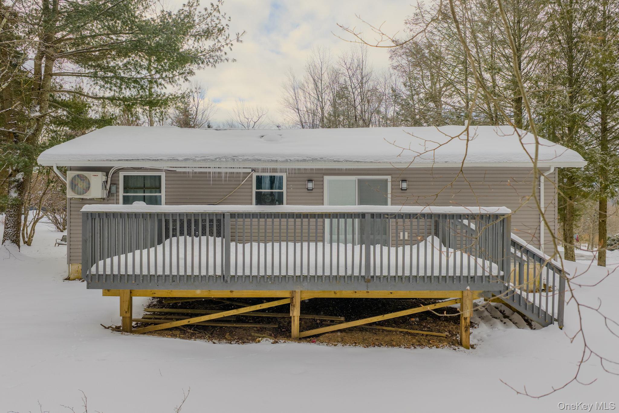 4 Ray Lane Loch Sheldrake, NY 12759 - Photo 23 of 29 a view of a patio with a bench