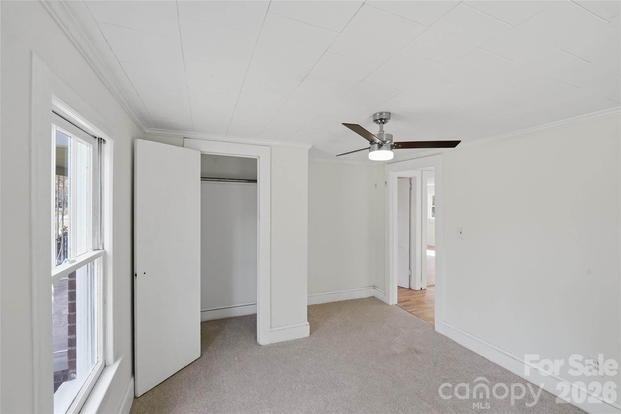 2231 Claremont Road Newton, NC 28658 - Photo 9 of 39 a view of empty room with ceiling fan