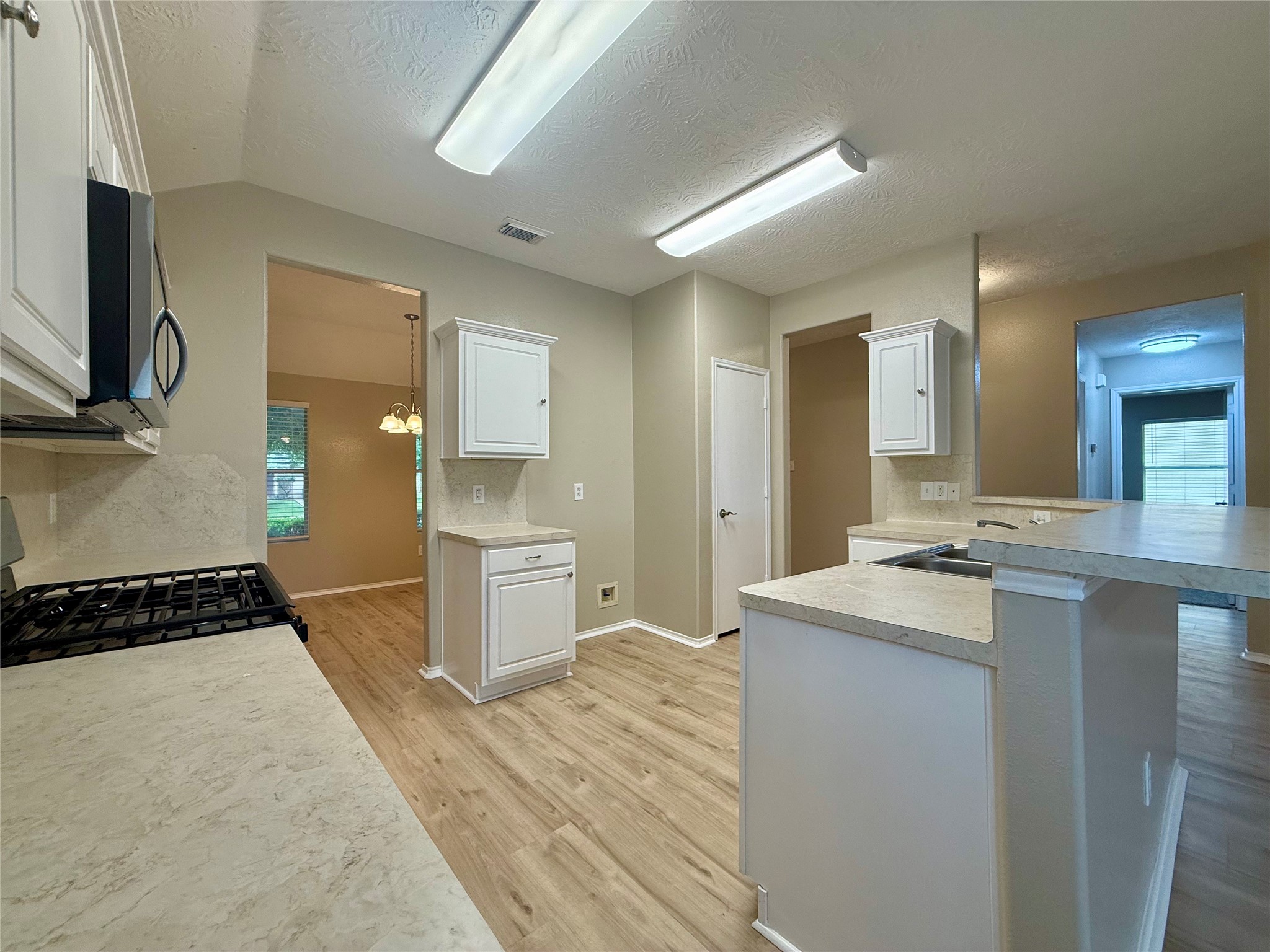 11423 Moonlight Ridge Drive Humble, TX 77396 - Photo 6 of 19 The spacious kitchen includes new countertops and new appliances.