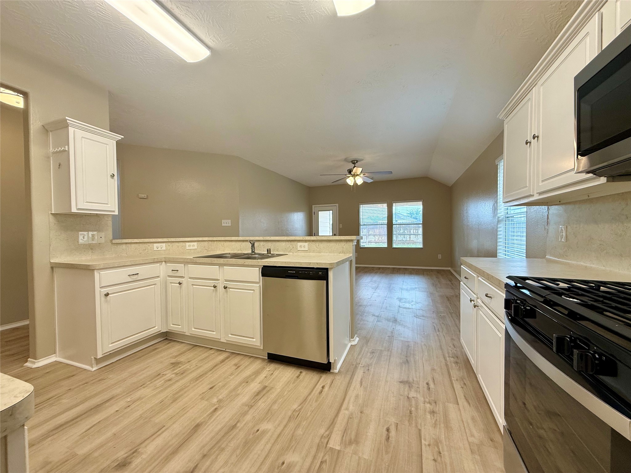 11423 Moonlight Ridge Drive Humble, TX 77396 - Photo 7 of 19 The kitchen is open to the family room and makes it perfect for family time or entertaining guests.