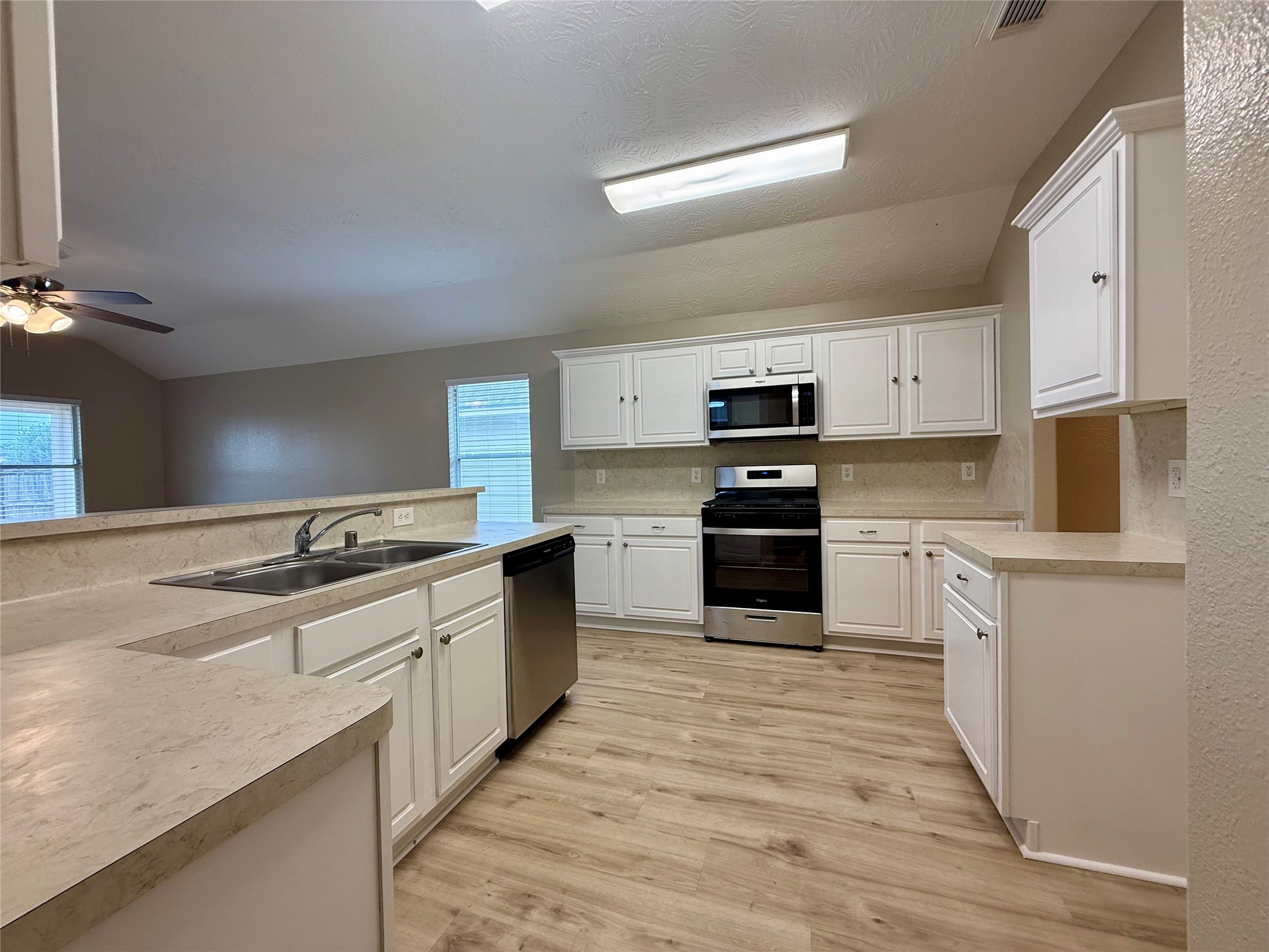 11423 Moonlight Ridge Drive Humble, TX 77396 - Photo 8 of 19 There is so much cabinet space in this kitchen!