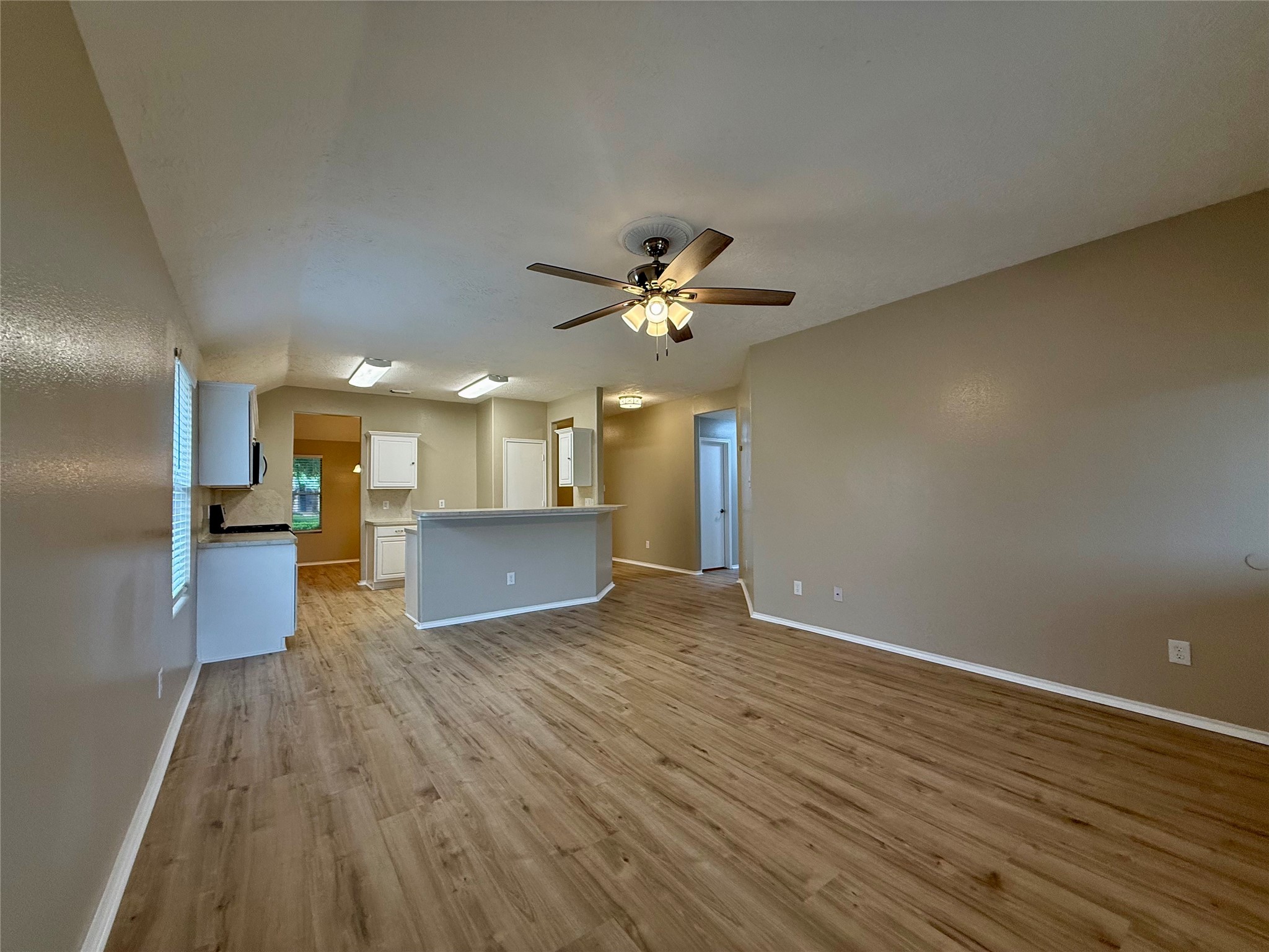 11423 Moonlight Ridge Drive Humble, TX 77396 - Photo 10 of 19 View of family room without any furniture.