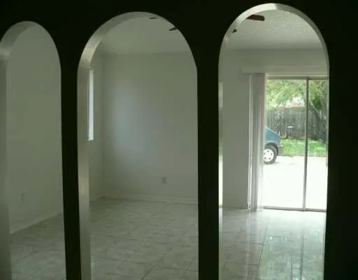 a view of two mirror in a room