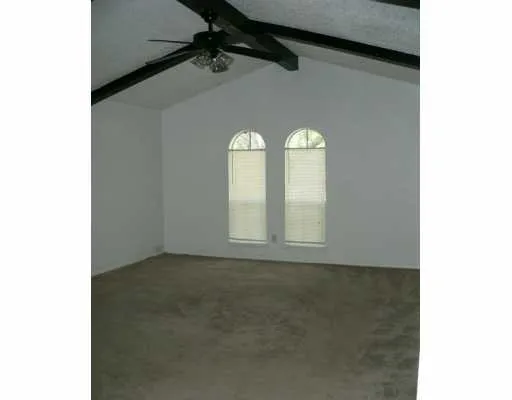 a view of a room with a window