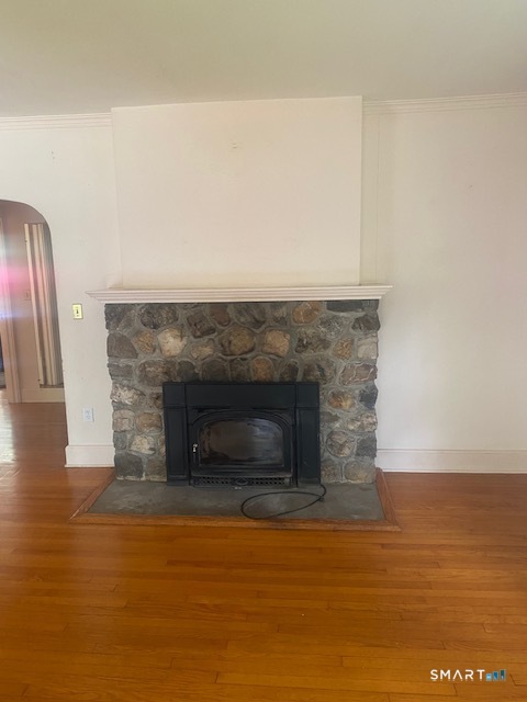 33 Flanders Road Bethlehem, CT 06751 - Photo 7 of 18 a room with a fireplace