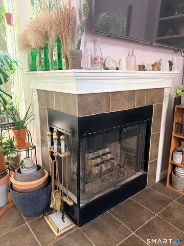 a room with fireplace and a fireplace