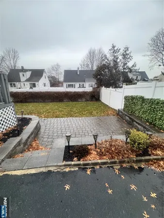 a view of a swimming pool and an outdoor space