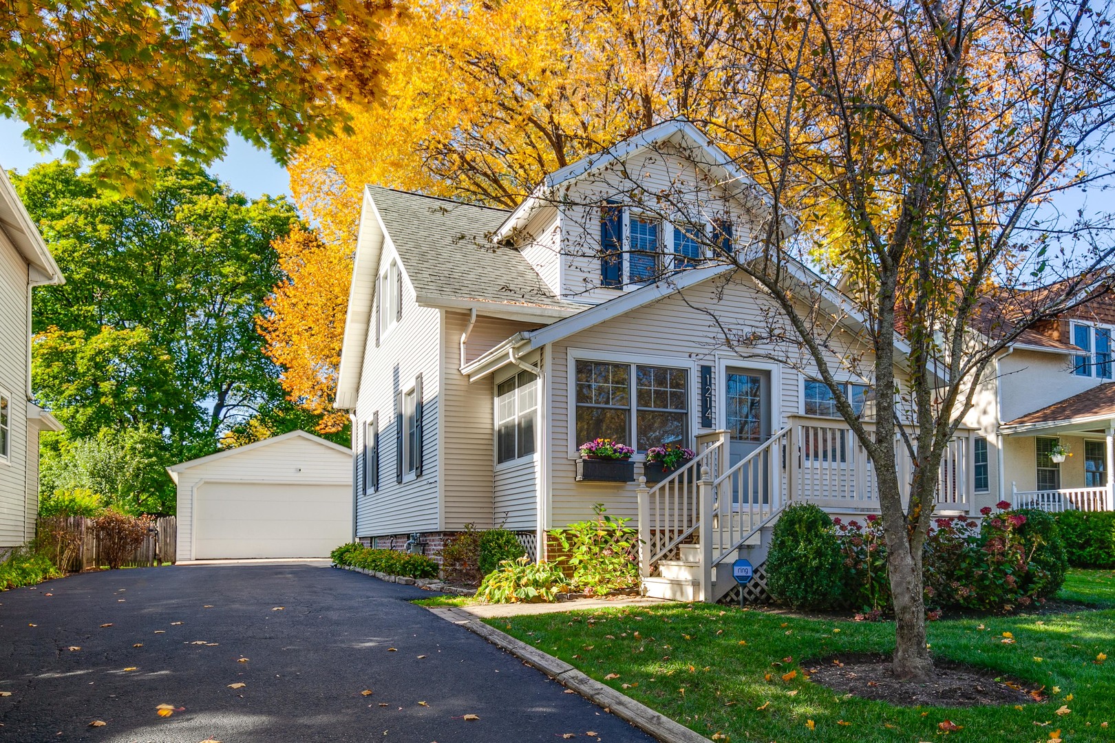 1214 Griffith Road Lake Forest, IL 60045 - Photo 1 of 24 a front view of a house with garden