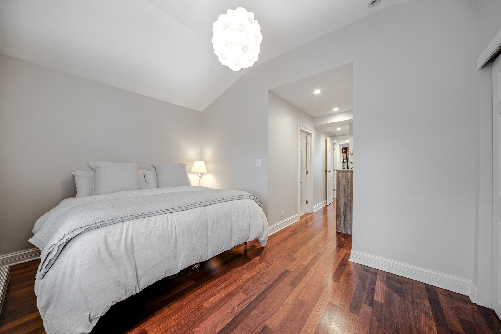 1214 Griffith Road Lake Forest, IL 60045 - Photo 12 of 24 a bedroom with a bed and wooden floor