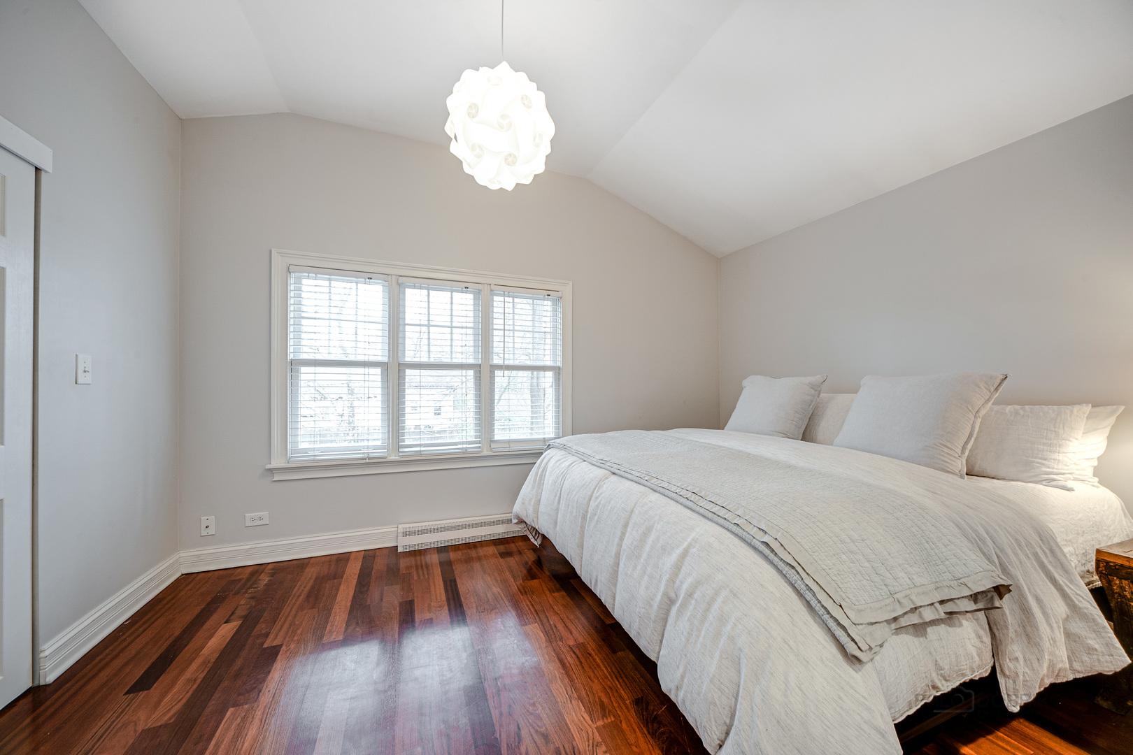 1214 Griffith Road Lake Forest, IL 60045 - Photo 13 of 24 a bedroom with a bed and wooden floor
