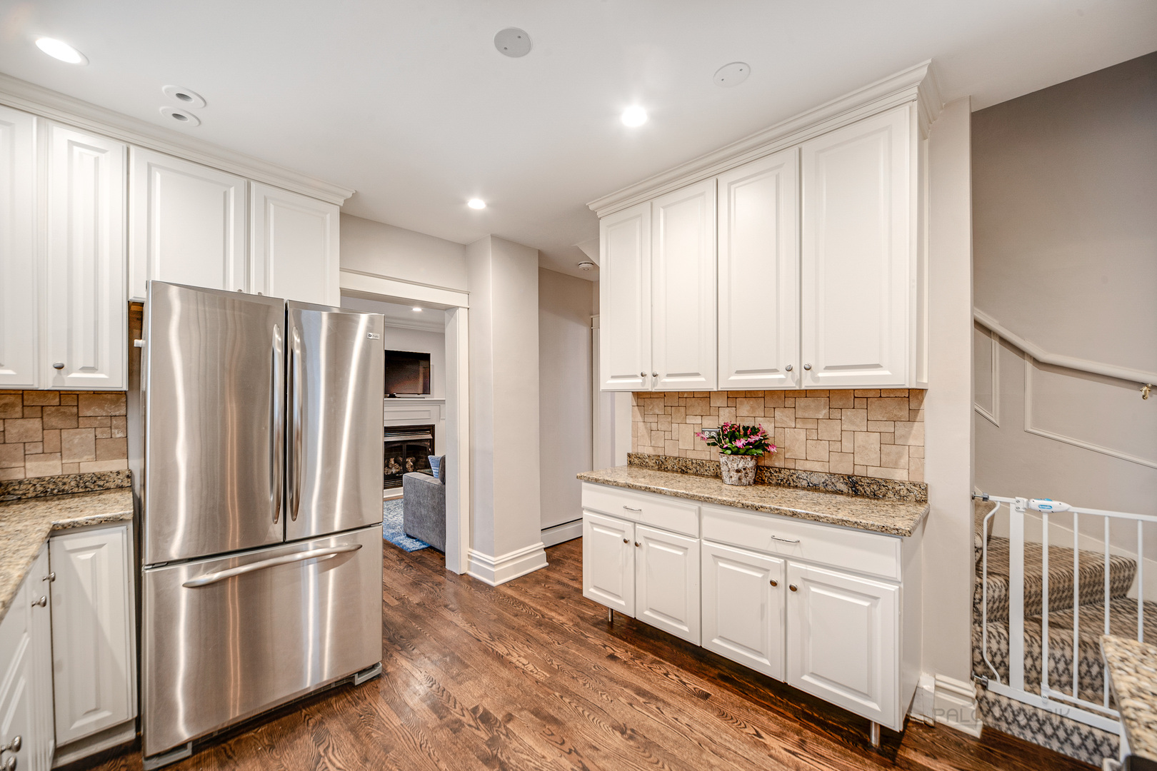 1214 Griffith Road Lake Forest, IL 60045 - Photo 9 of 24 a kitchen with stainless steel appliances a refrigerator sink and cabinets