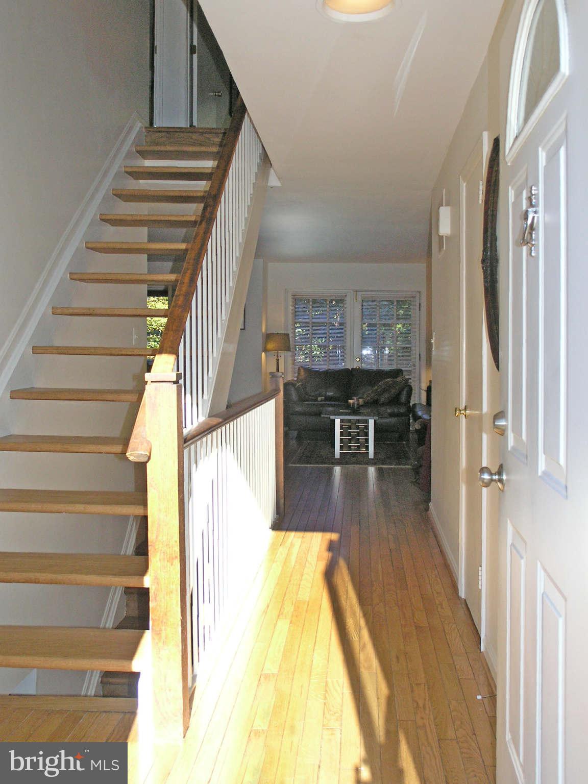 2168 Golf Course Drive Reston, VA 20191 - Photo 2 of 30 a view of entryway and hall with wooden floor