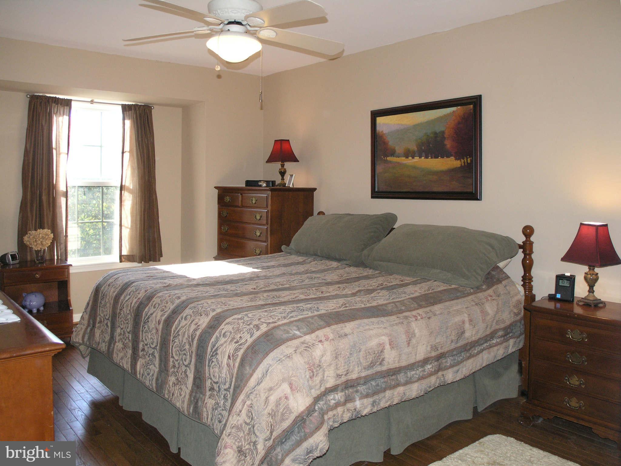 2168 Golf Course Drive Reston, VA 20191 - Photo 12 of 30 a bedroom with bed and window
