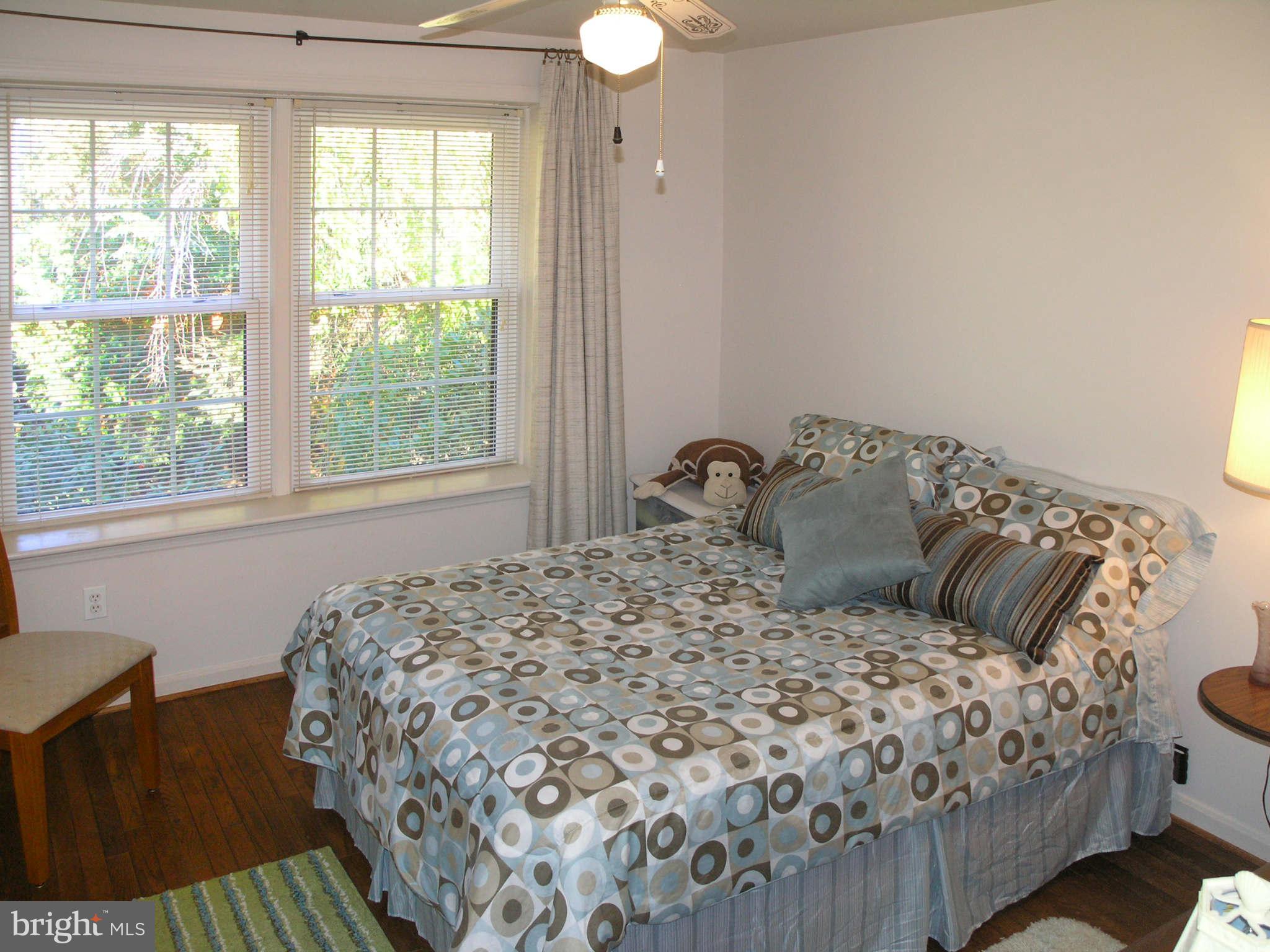 2168 Golf Course Drive Reston, VA 20191 - Photo 16 of 30 a bedroom with a bed and a window