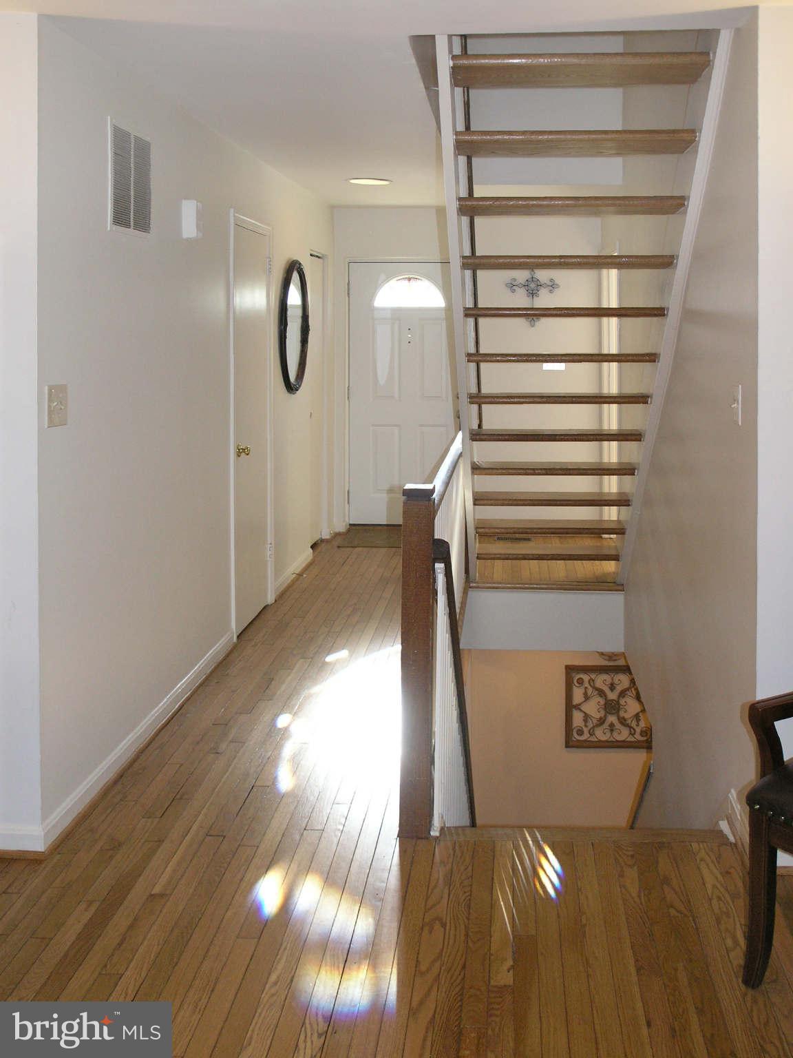 2168 Golf Course Drive Reston, VA 20191 - Photo 3 of 30 a view of entryway with wooden floor