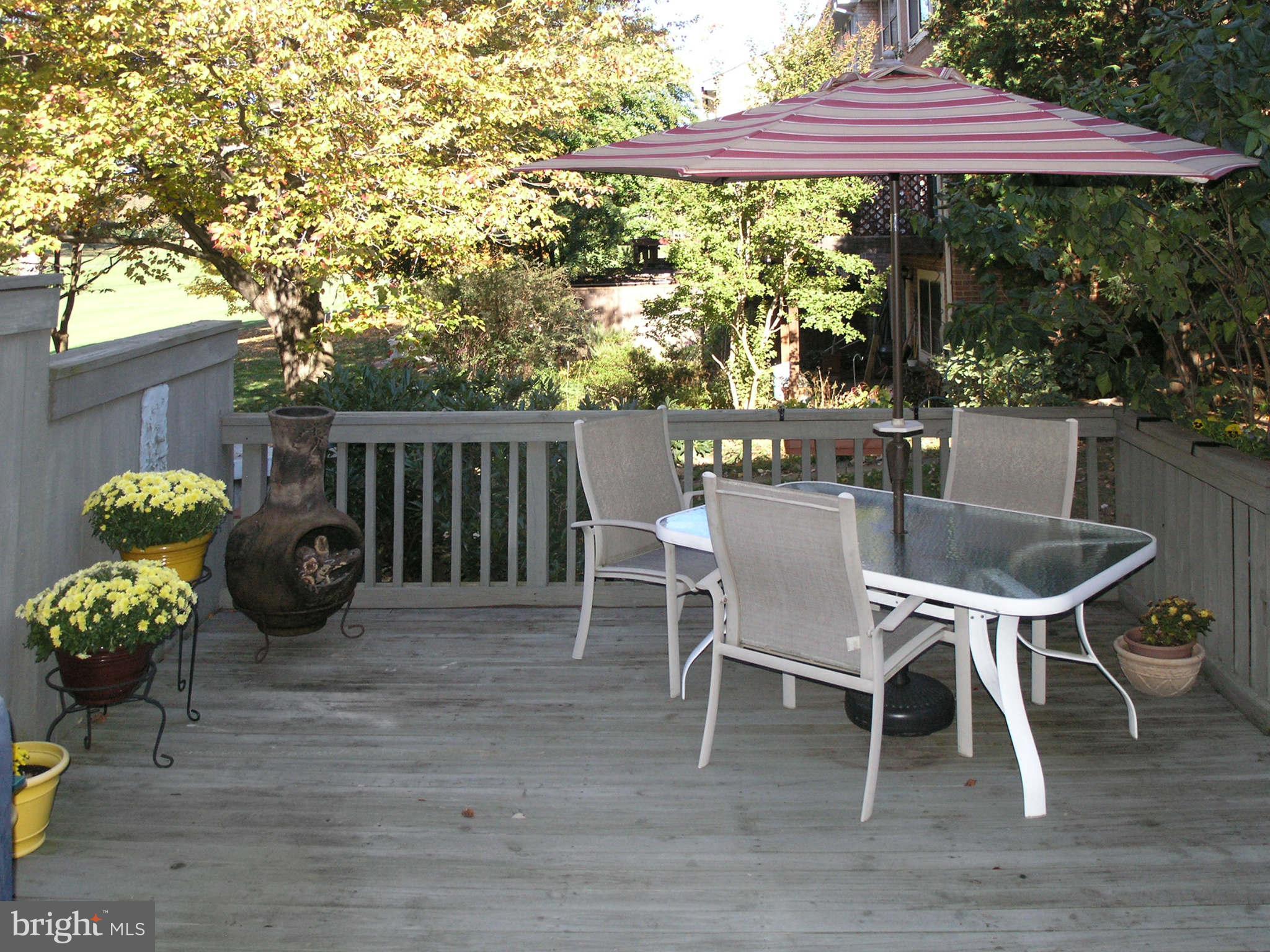 2168 Golf Course Drive Reston, VA 20191 - Photo 22 of 30 a view of a chairs and table in the patio
