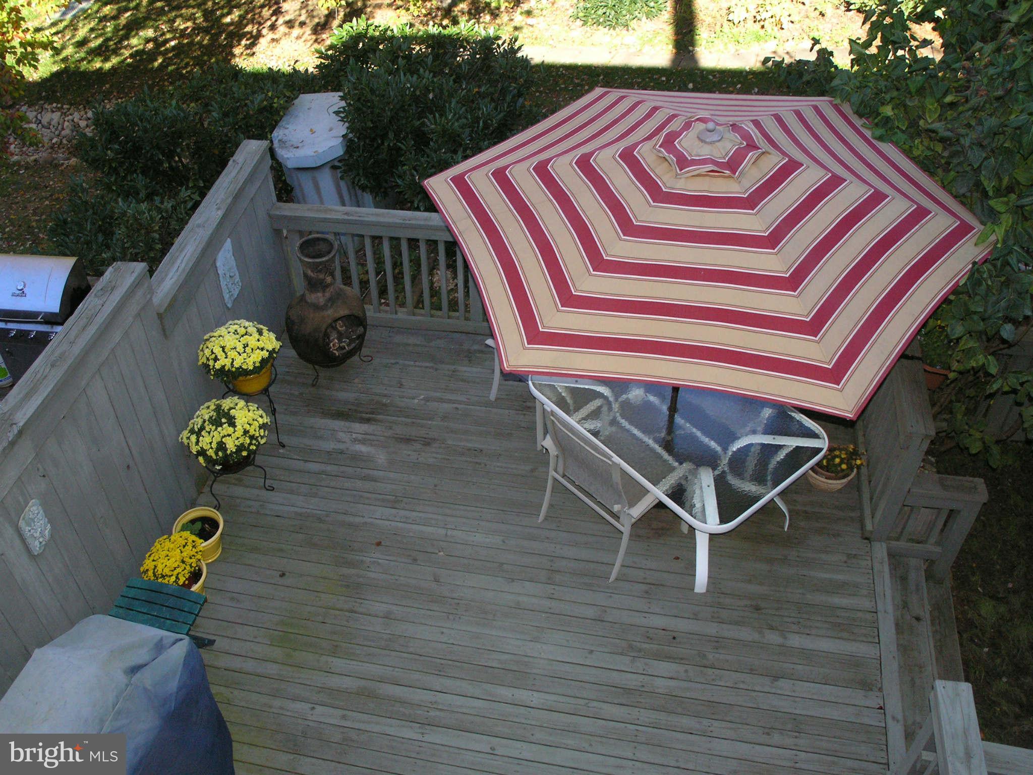 2168 Golf Course Drive Reston, VA 20191 - Photo 23 of 30 a front view of a house with outdoor seating