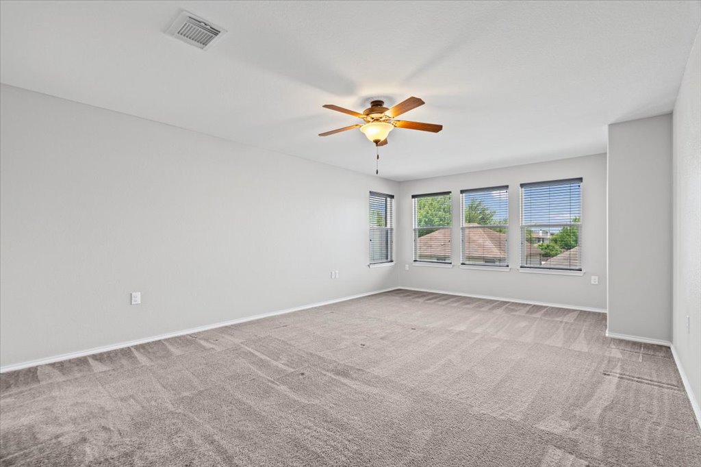 8804 Capitol View Drive Austin, TX 78747 - Photo 23 of 32 a view of an empty room and a window
