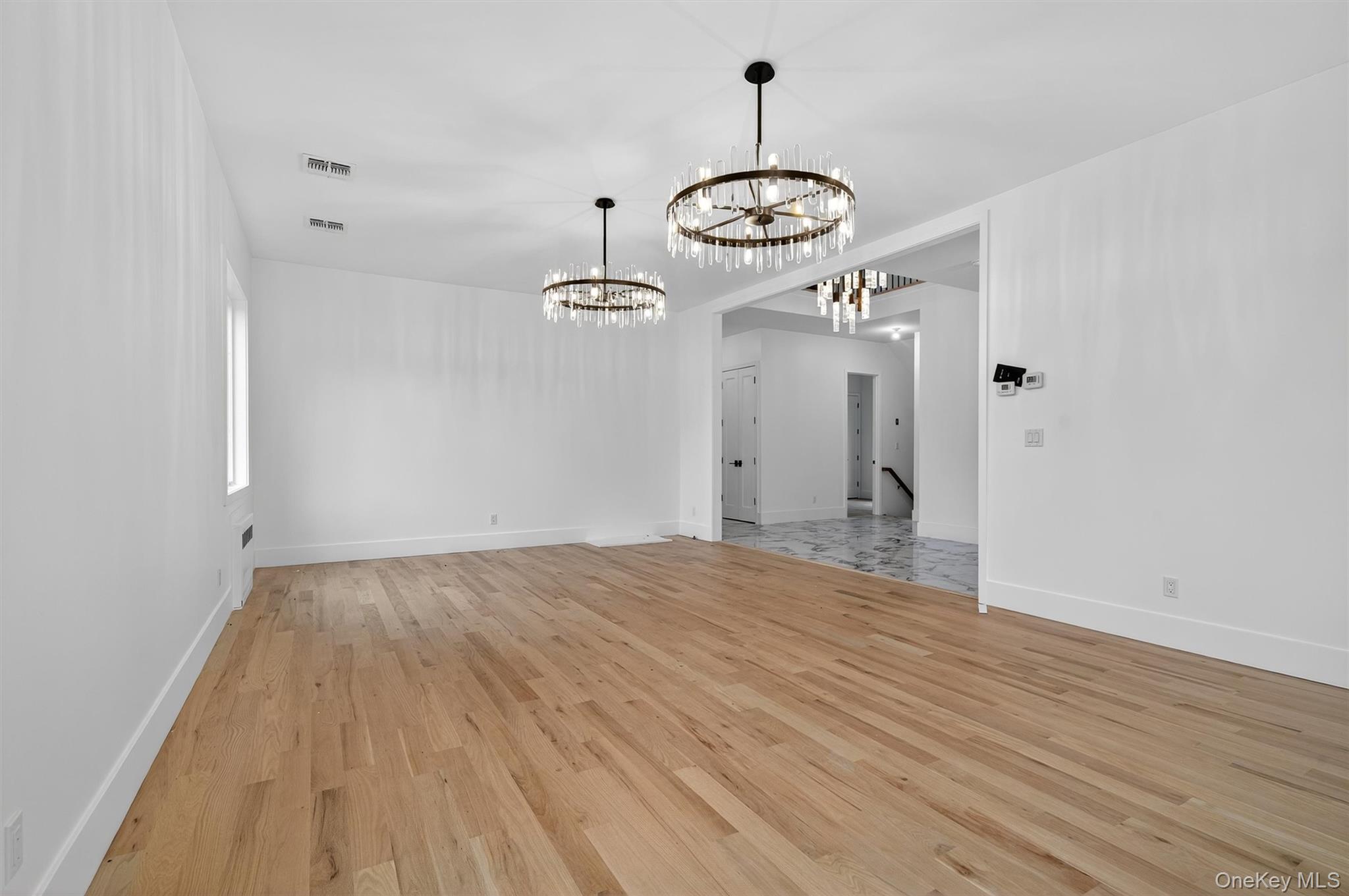 3 Forshee Street Monroe, NY 10950 - Photo 14 of 43 a view of empty room with wooden floor and rug