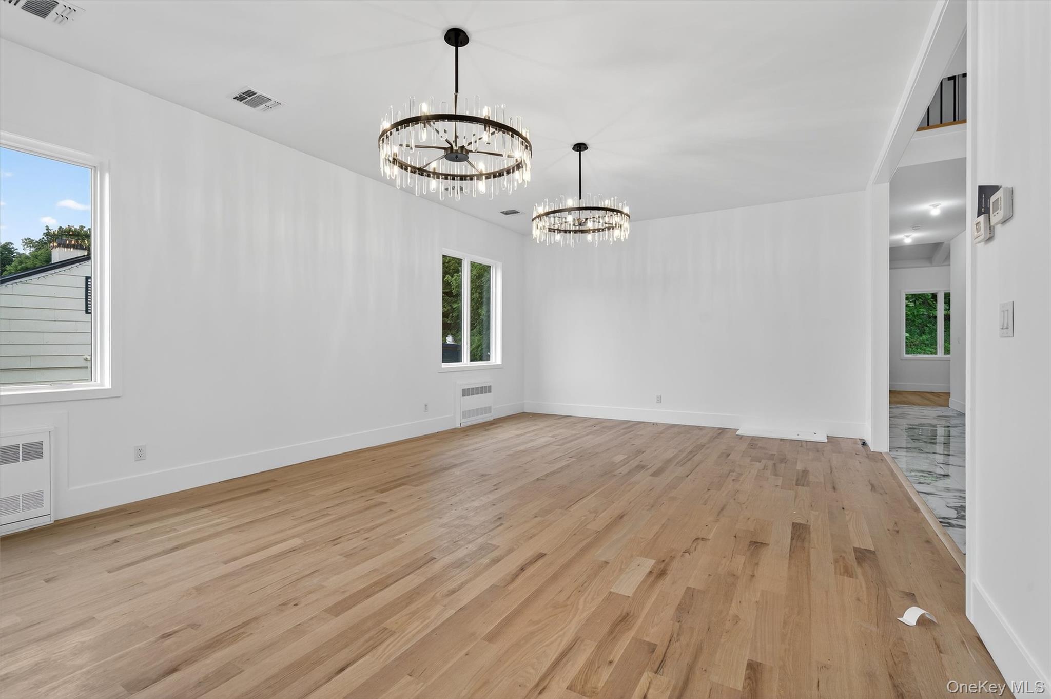 3 Forshee Street Monroe, NY 10950 - Photo 15 of 43 a view of empty room with wooden floor and window
