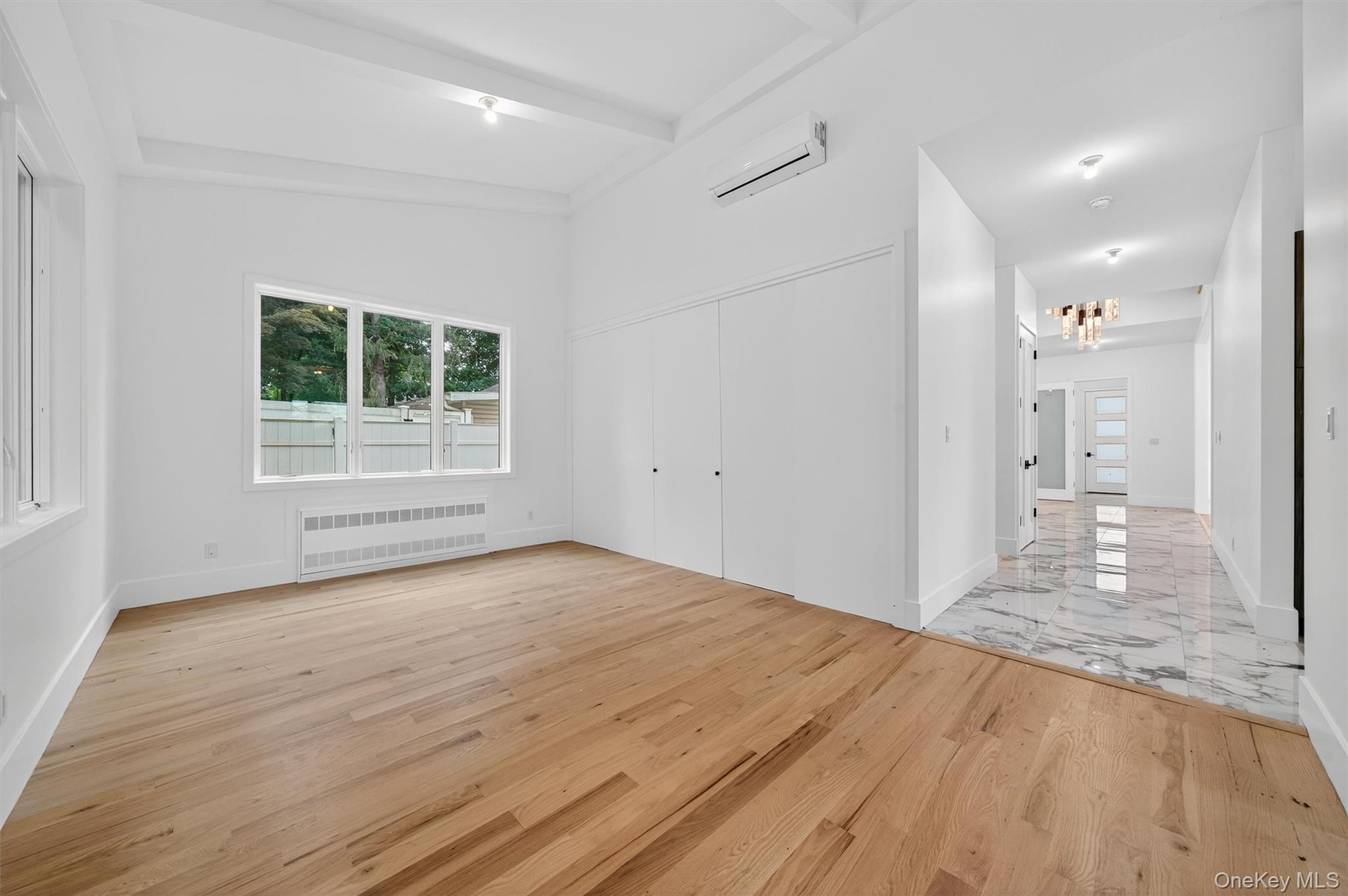 3 Forshee Street Monroe, NY 10950 - Photo 17 of 43 a view of empty room with wooden floor and windows