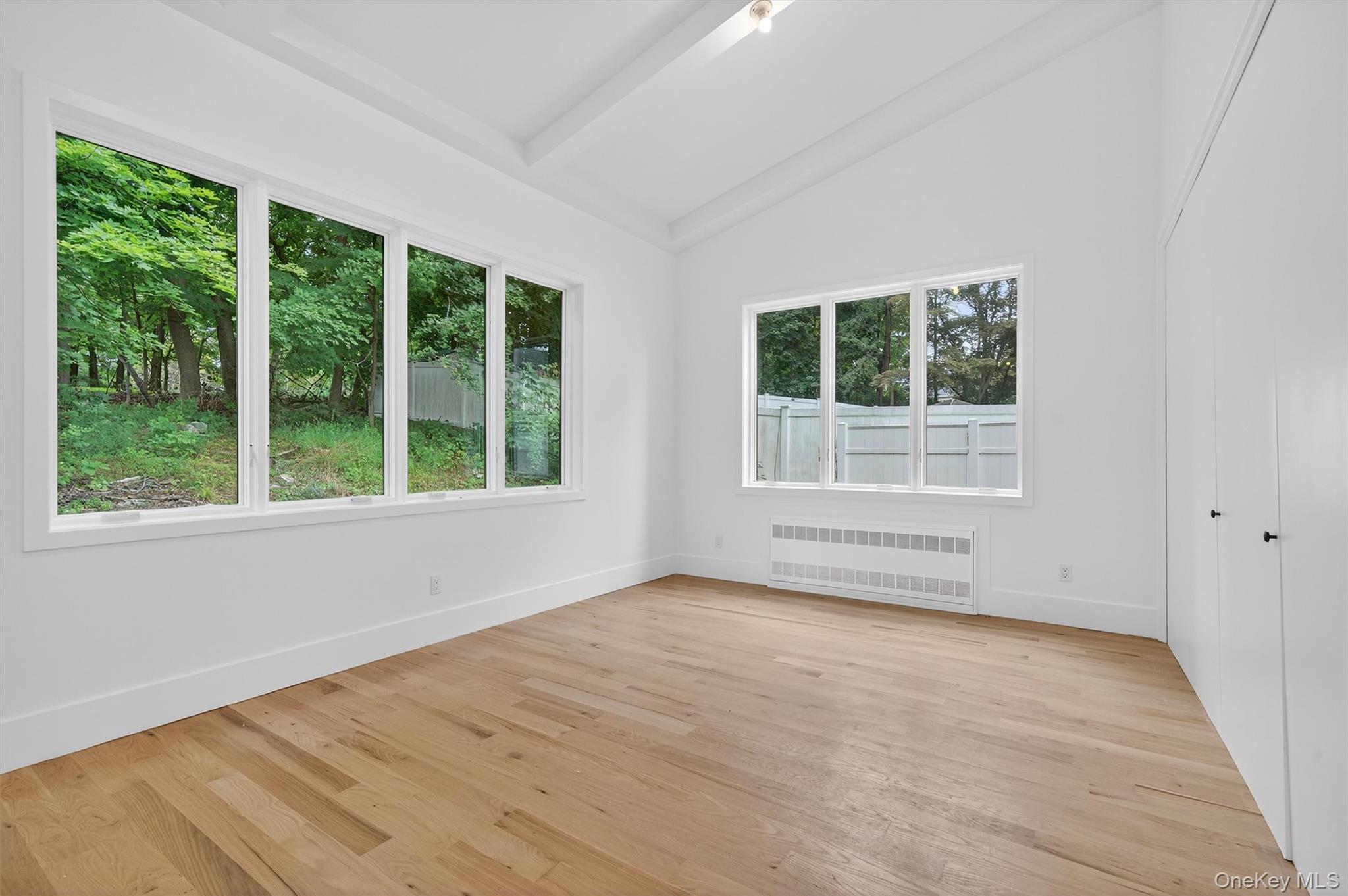 3 Forshee Street Monroe, NY 10950 - Photo 19 of 43 a view of an empty room with wooden floor and a window