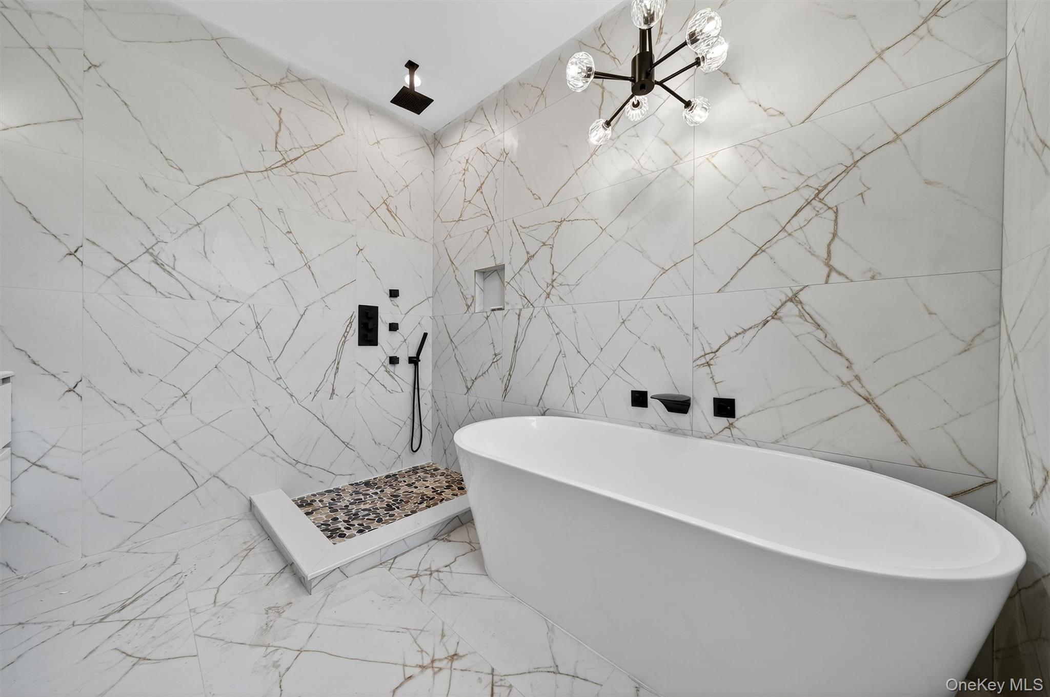 3 Forshee Street Monroe, NY 10950 - Photo 33 of 43 a bathroom with a bathtub and shower