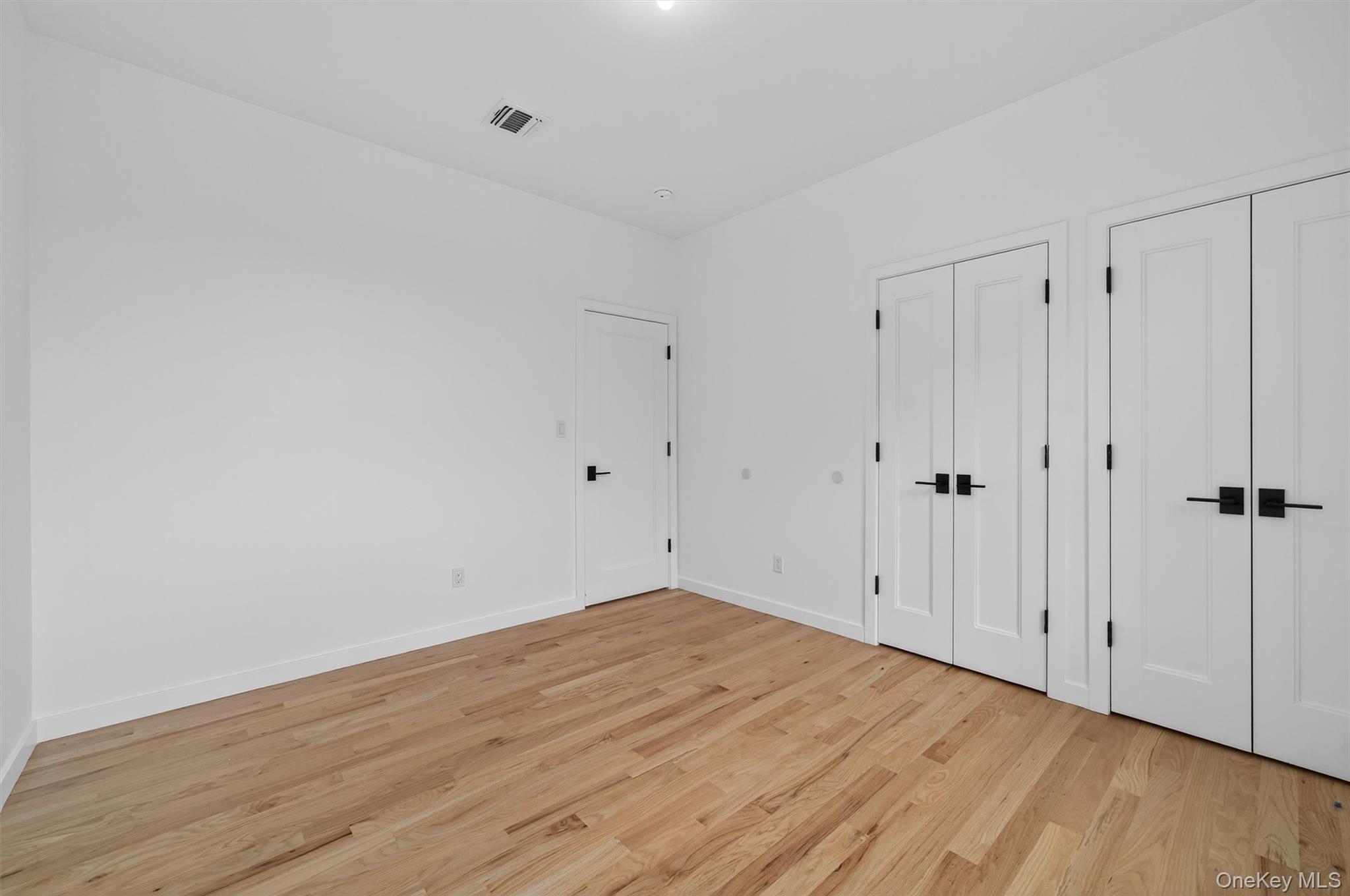 3 Forshee Street Monroe, NY 10950 - Photo 37 of 43 a view of empty room with wooden floor