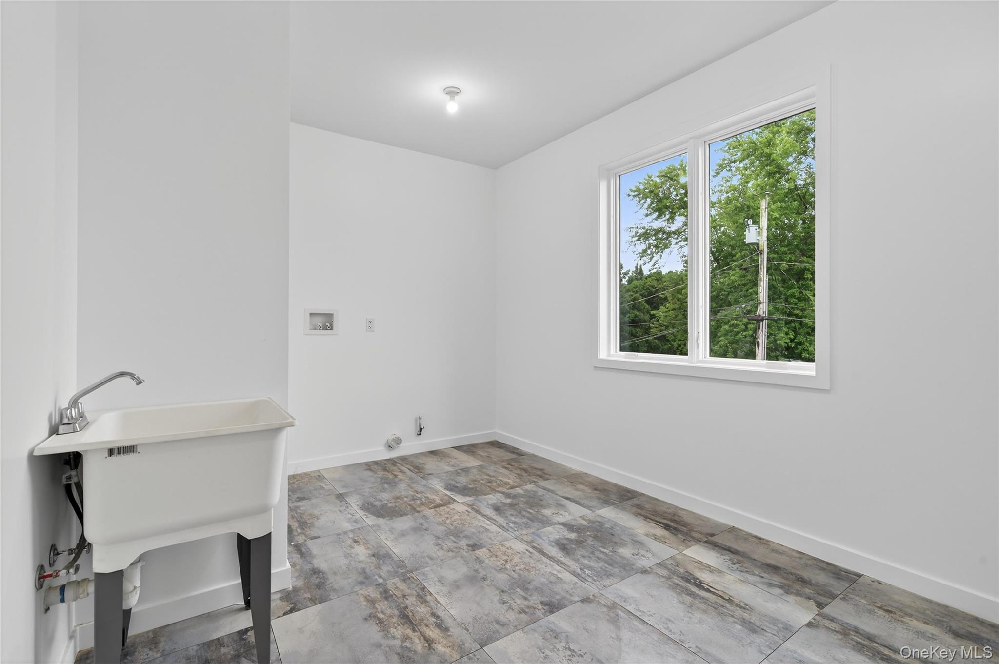 3 Forshee Street Monroe, NY 10950 - Photo 41 of 43 a view of a room that has a window and a table in it