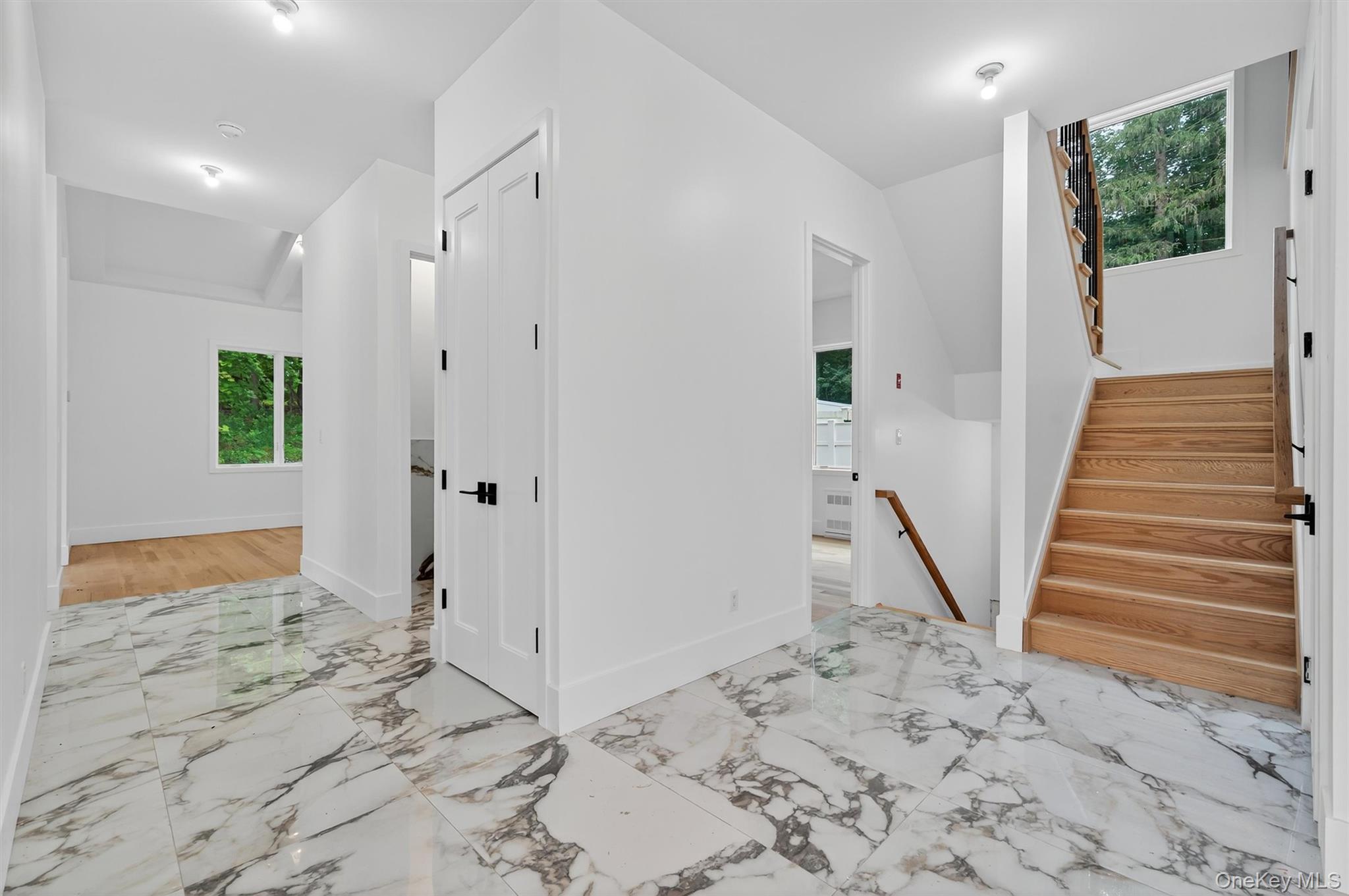 3 Forshee Street Monroe, NY 10950 - Photo 7 of 43 a view of entryway with wooden floor and stairs