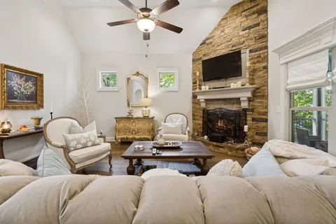a kitchen with a sink cabinets and wooden floor