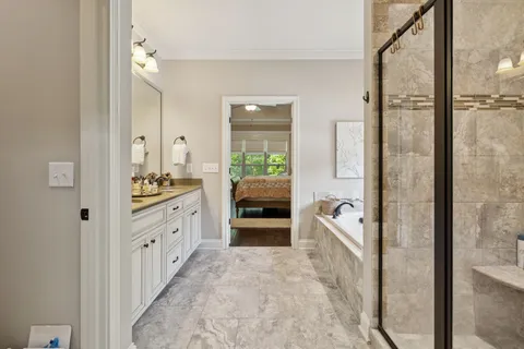 a room with a bed and a chair