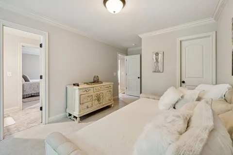 a bedroom with a bed and a closet