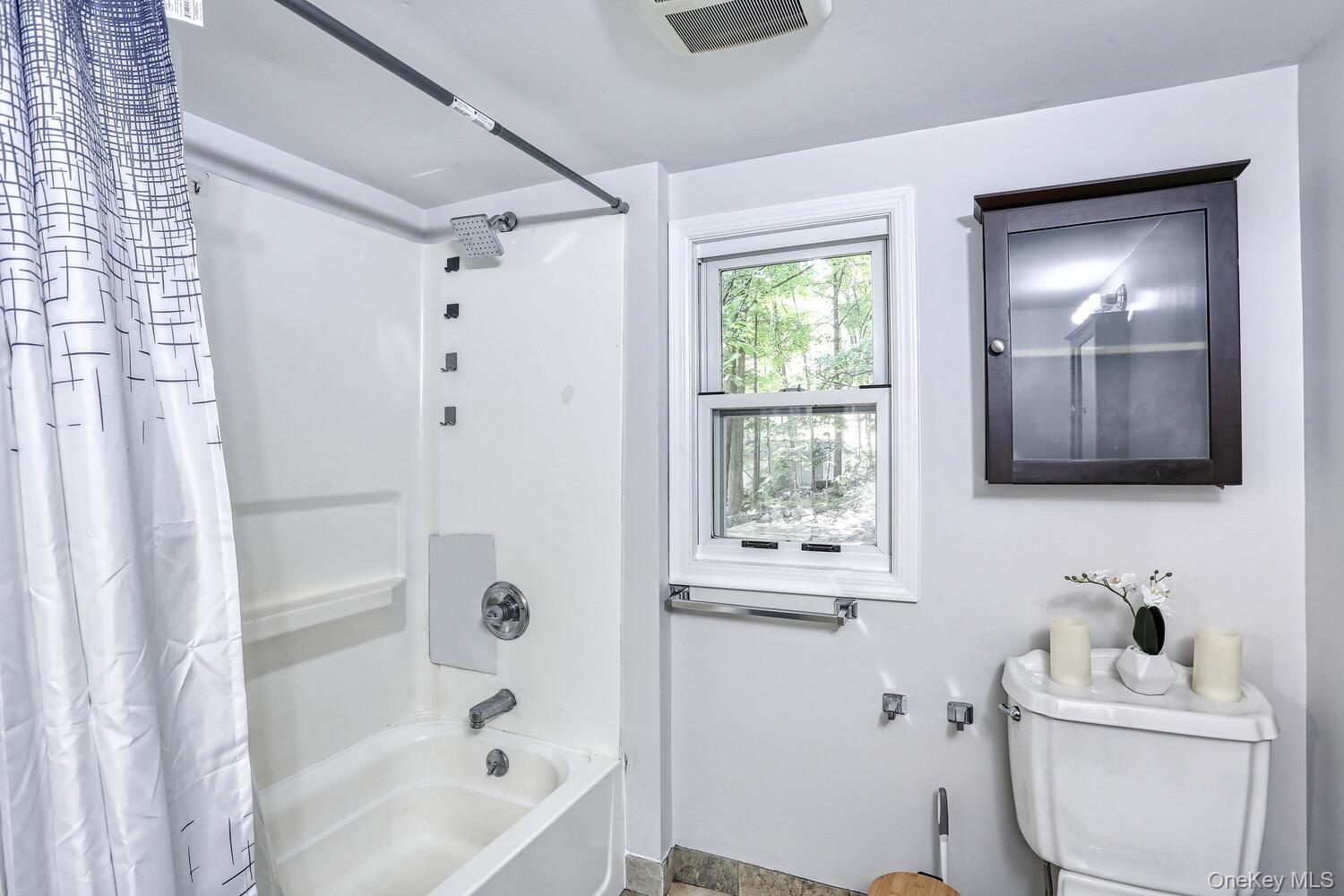 329 Call Hollow Road Haverstraw, NY 10980 - Photo 15 of 28 Full bathroom with shower / bath combination with curtain and toilet
