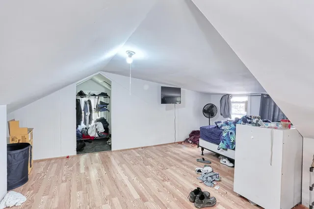 a view of a livingroom with wooden floor