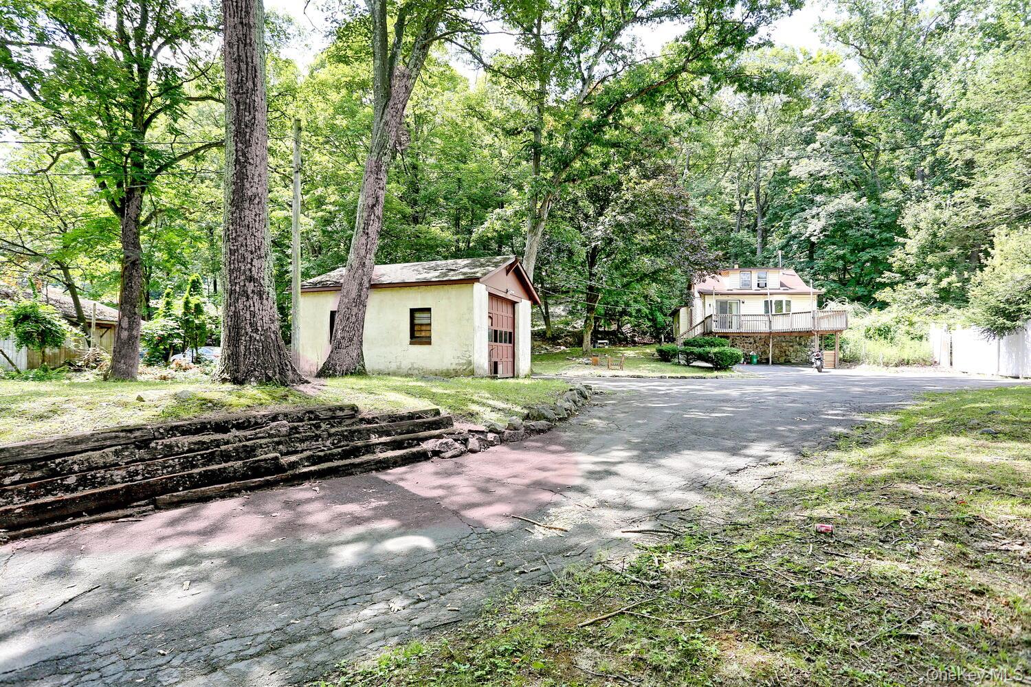 329 Call Hollow Road Haverstraw, NY 10980 - Photo 24 of 28 View of yard with an outbuilding and driveway