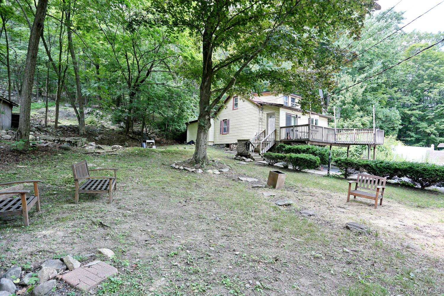 329 Call Hollow Road Haverstraw, NY 10980 - Photo 27 of 28 View of yard featuring a wooden deck