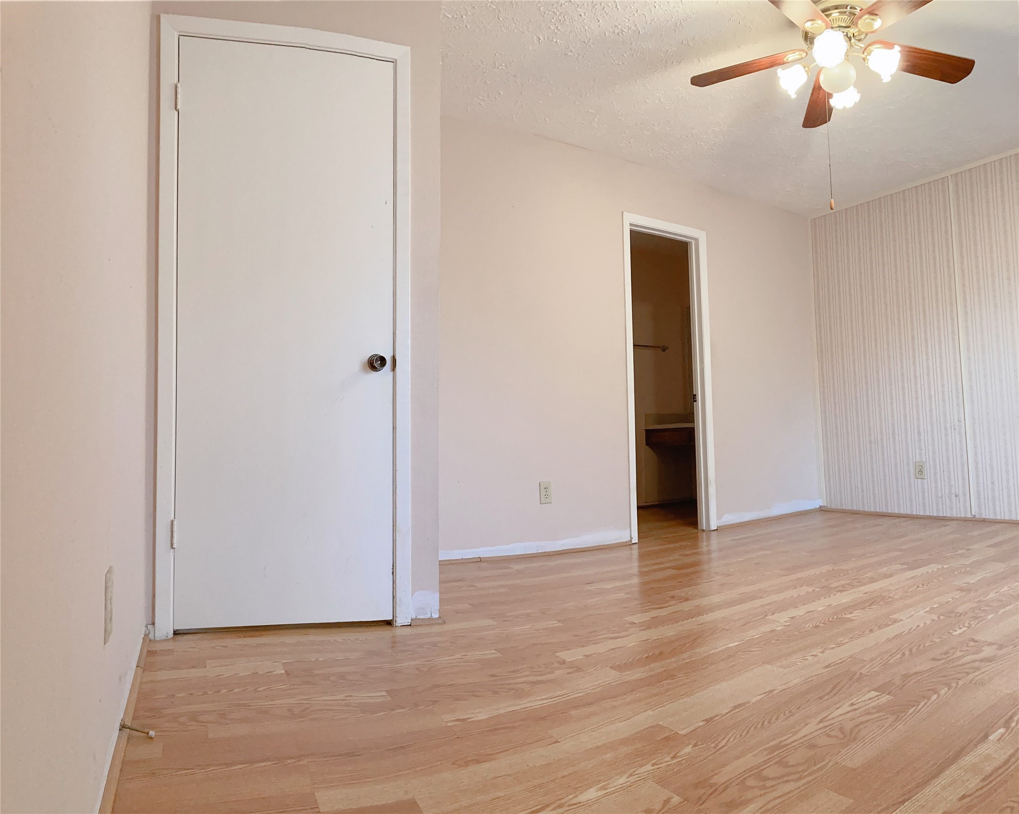 19518 Munsey Court Katy, TX 77449 - Photo 27 of 45 a view of an empty room with wooden floor