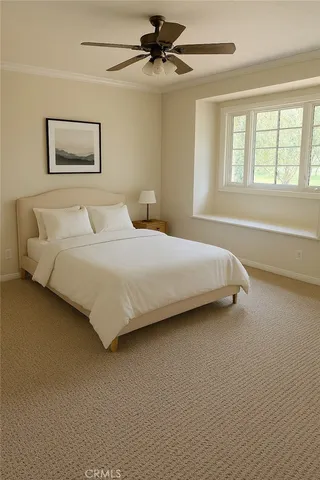 a bedroom with a bed and window